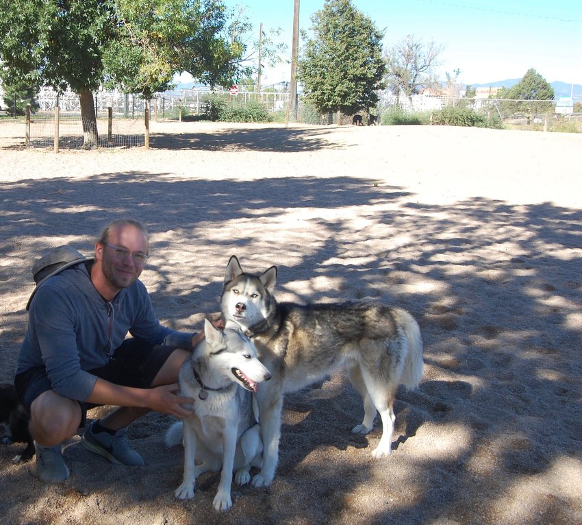 Brett Forsberg with his dogs, Dolly and Chewy, during their daily visit to Berkeley Dog Park.